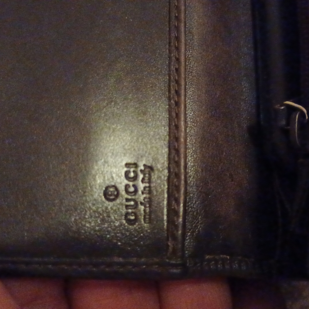 Gucci triple fold women's wallet